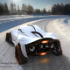 Illustration for article titled Frost Snow Sport Car Changes Tires for Treads